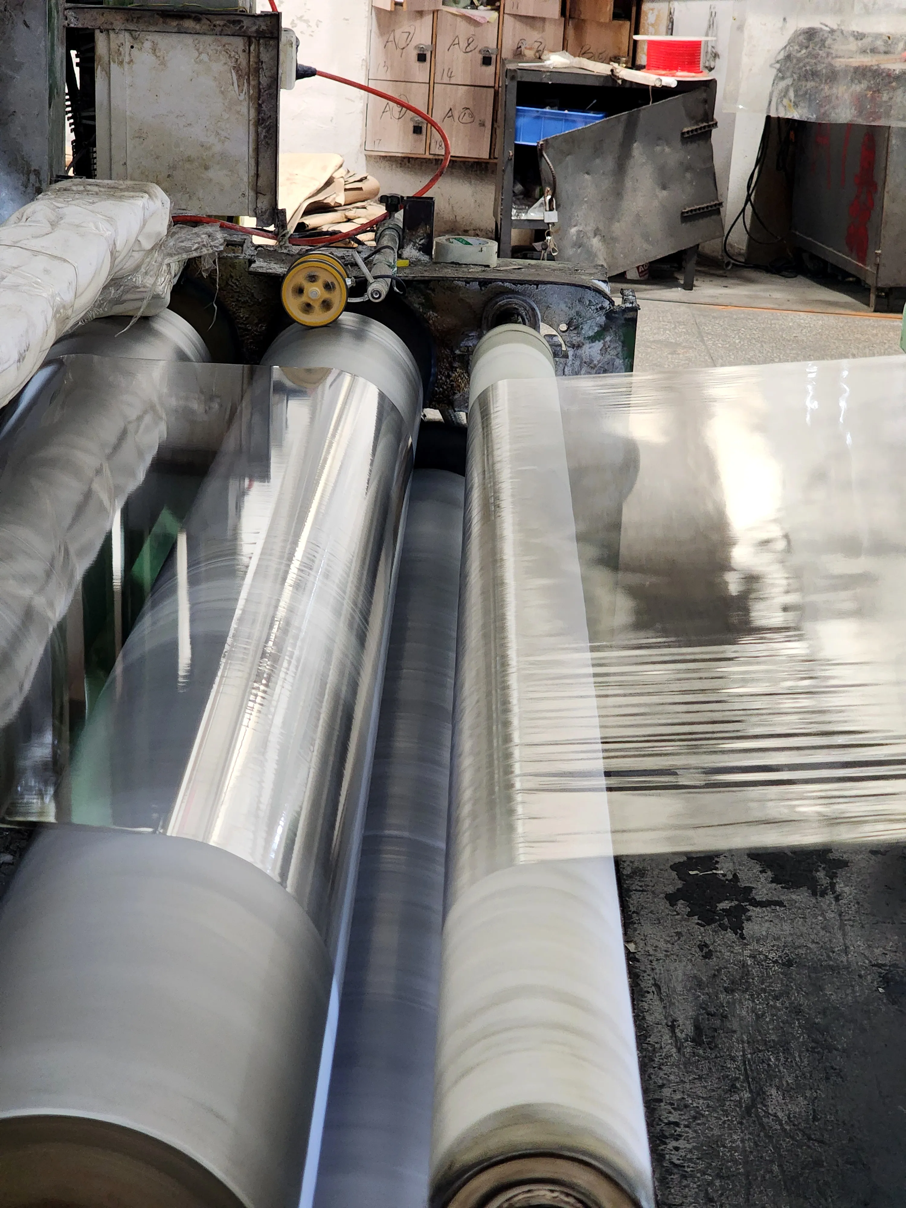 Transparent film process — rolls running through the line